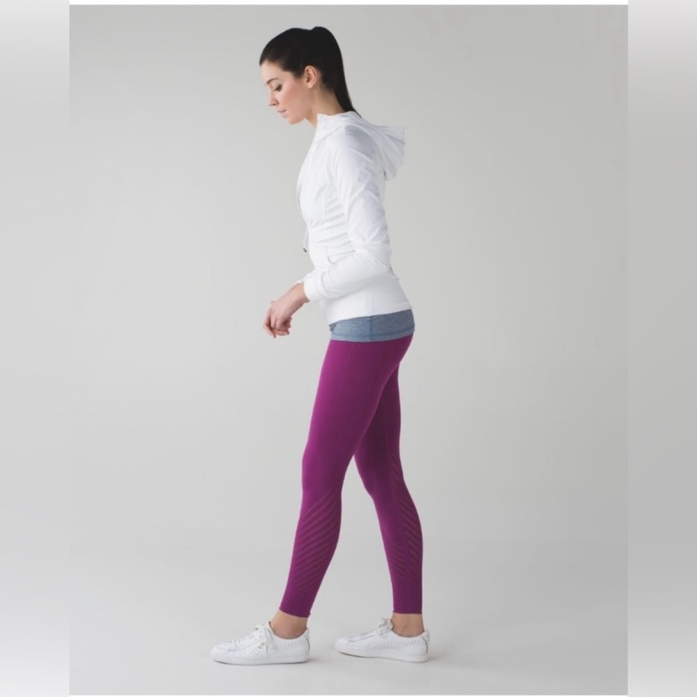 Used Lululemon Fuschia leggings with holes/‘eagle - size (no tag)